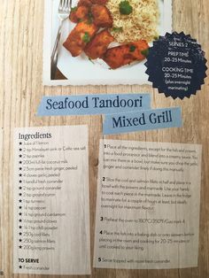 a menu for seafood tandoori mixed grill on a wooden table with information about it