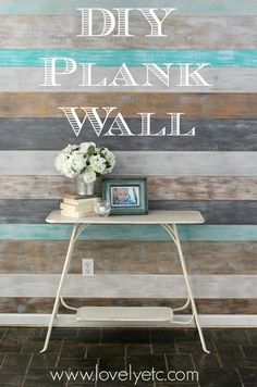 the diy plank wall is painted with white and blue paint on it's side