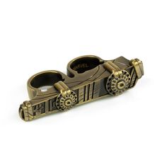 a pair of gold and black shoes with wheels on the bottom one has an eyeball in it