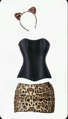 a corset and leopard print skirt are on display in front of a white background