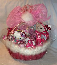 a basket filled with stuffed animals and other items