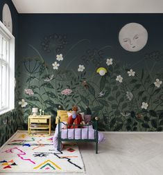 a child's room decorated with flowers and plants