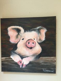 a painting of a pig hanging on the wall