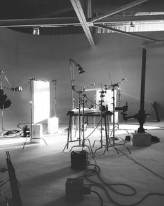 black and white photograph of equipment in an empty room