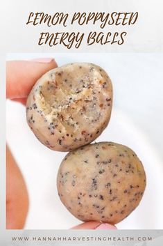 two cookies are being held in front of the camera with text overlay that reads lemon poppy seed energy balls