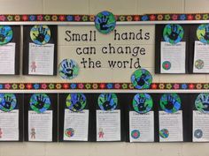 a bulletin board with hand prints on it and words that say small hands can change the world