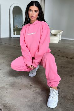 Cute and comfy in the Series 3 Sweatpants. This babe offers a soft fleeced inside, elasticated waistband with drawstrings, cuffed ankles and a puffed 'THATSSOFETCH' logo. Pair her with the matching hoodie and sneakers for an off duty cool girl look. FABRICATION: 65% Cotton 35% Polyester SIZING: Crystal's height is 162cm and wears a size AU XS/S Pink Sport Set, Crop Outerwear, Attention Getters, Orange Swimwear, White Runners, Green Swimwear, Pink Sweat, Summer Formal Dresses, Female Outfits