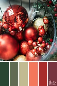 a basket filled with red and green ornaments