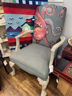 a chair with an octopus painted on it