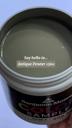 someone is holding a can of paint with the words say hello to antique power 1650