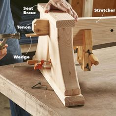 a person working with woodworking tools on a table