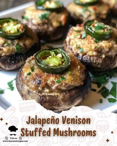 stuffed mushrooms with jalapeno venison toppings on a white plate