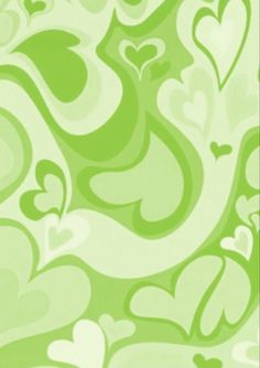 a green and white wallpaper with hearts on it's backgroung