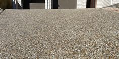 An image of aggregate concrete driveway Aggregate Concrete Driveway, Local Business, Cairns, Driveway