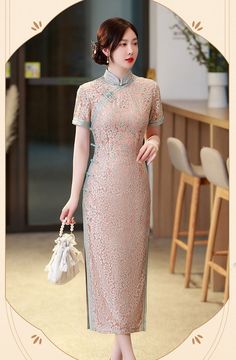 Step into timeless elegance with this exquisite lace Cheongsam, perfect for any special occasion. This dress features a delicate floral lace overlay, creating an ethereal and sophisticated silhouette. The short sleeves and high collar add a touch of traditional charm, while the soft pastel hue enhances its graceful appeal. It an excellent choice for events like weddings, Chinese New Year celebrations, formal events, cultural occasions or elegant evening gatherings. Size Guide: Size Bust(cm) Wais Chinese New Year Fashion, Pink Cheongsam, Modern Qipao Dress, Lace Cheongsam, Modern Qipao, Qipao Cheongsam, Qipao Dress, Embroidery Gifts, Wedding Essentials