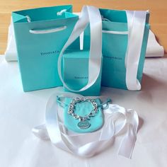 Just Got Back From Tiffany On Sept 30th 2023 This Beauty Is Retired And Rare Tiffany & Co. Bracelet Shows Some Light Glare Tiffany Box Tiffany Dust Cover Tiffany Ribbon Tiffany Shopping Bag Tiffany Notecard Tiffany And Co Bracelet, Tiffany Box, Dust Cover, Tiffany & Co., Blue And Silver, Note Cards, Women Jewelry, Blue, Silver