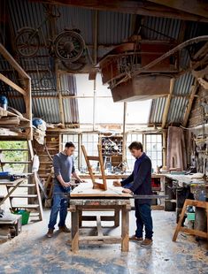 two men working in a wood shop