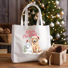 a white bag with a golden retriever on it and a christmas tree in the background