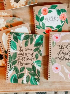 three notebooks with floral designs on them and the words prayer are written in cursive writing