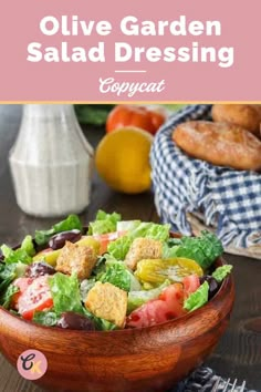 an olive garden salad dressing recipe in a wooden bowl with croutons on the side