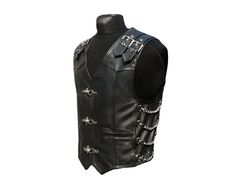 Explore this exquisite genuine leather vest, adorned with a hint of gothic charm in its design. Each piece is meticulously handcrafted with utmost care and devotion. Product Details: Features an aeroplane buckle front closure for a unique touch. Equipped with two front pockets for added functionality. Enhanced by stylish side chains for a distinctive look. Enjoy a personalized fit with adjustable shoulder straps. Adorned with nickel-colored hardware for an elegant finish. The interior is fully l Steampunk Vest For Halloween Cosplay, Black Gothic Vest For Alternative Fashion, Gothic Vest For Halloween Cosplay, Gothic Sleeveless Vest, Black Gothic Vest For Larp, Punk Leather Vest, Goth Vest, Steampunk Vest, Leather Biker Vest