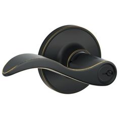 a black and gold door handle on a white background