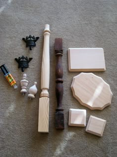 various wooden items laid out on the floor