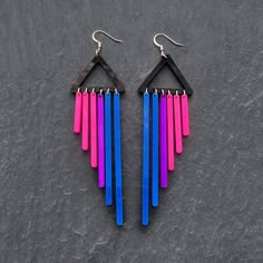 "BI-FURIOUS DANGLES \"Remember, bisexuality doesn't mean halfway between gay or straight. It is its own identity.\" Wear these bold and colourful statement earrings with pride. These handmade mirrored and glossy acrylic chimes dance with the wind, and shine with the sun. Perfect for spreading love and positive vibes (and avoiding annoying questions). Available as hook or Clip-on so no one misses out on the fun!  Approx 3cm by 9.5cm in size from top of triangle to lowest hanging chime.  Hypoallergenic, Nickel free and lightweight! All of our Additions are designed and carefully hand crafted in our Sydney studio, please allow up to 1-3 days for your order to be shipped." Pride Earrings, Arte Van Gogh, Estilo Hippie, Funky Jewelry, Pretty Jewellery, Cute Jewelry, Clay Earrings, Positive Vibes, Things To Buy