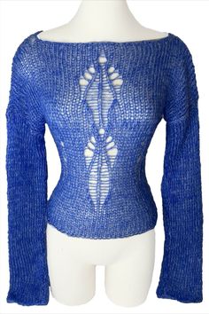 The Sapphire Top is a one of kind top that has open stitches that create a symmetrical design. #knitting #knit #knitwear #knittersofinstagram #knitstagram #knitted #knittingaddict #knittinglove #knitter #knits #knitters #knittersoftheworld #knitwears #knitlove #knittersofig #knittinginspiration #knithat #knittingpattern #knitaddict #knitsweater #knitt #knitlife #knittedhat #knitdress #knitsagram #knitspiration #knittersgonnaknit #KnittedSweater #knitdesign #knitweardesign Stretch Blue Knit Top For Winter, Blue Knit Stretch Sweater, Blue Stretch Knit Sweater, Blue Stretch Knit Top, Blue Stretch Knit Top For Spring, Blue Fitted Textured Knit Sweater, Stretch Knit Hollow Out Tops, Stretch Knit Tops With Hollow Out Details, Blue Pointelle Knit Top For Fall