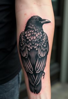 Stunning Crow Tattoos Ideas & Designs Crow Shoulder Tattoo For Men, Raven Tattoo Feminine Arm, Traditional Crow Tattoo, Traditional Tattoo Black And Grey, Crow Tattoos, Crow Tattoo Design, Unique Wrist Tattoos, Mens Shoulder Tattoo, Crow Tattoo