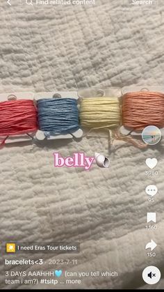 three spools of yarn are on the bed