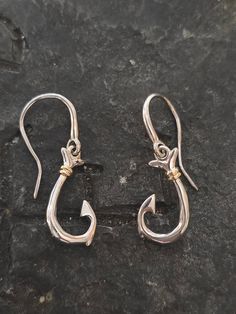 These earrings are beautiful and delicate. Made of solid sterling silver with 14kt vermiel accents and makes a great gift for anyone that loves fishing or into that lifestyle. Hook Earrings Gold, Key West Fl, Fish Hook Earrings, Earrings Sterling Silver, Key West, Fish Hook, Hook Earrings, Sterling Earrings, Sterling Silver Earrings