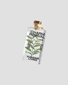 a bottle of cham revival on a gray background