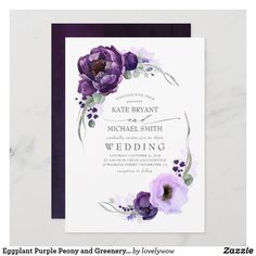 an elegant wedding card with purple flowers and greenery on the front, in watercolor