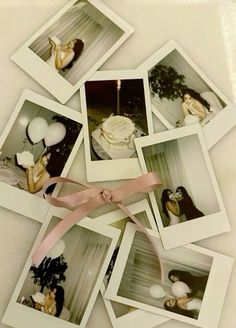 several polaroid photos with pink ribbon and balloons in the background, all stacked up on top of each other