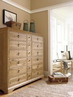 a large wooden dresser sitting in a living room