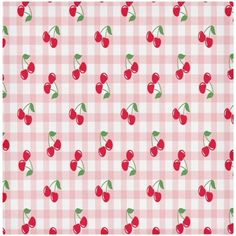 a pink and white checkered table cloth with cherries on the front, green leaves