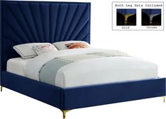 a bed with blue upholstered headboard and pillows