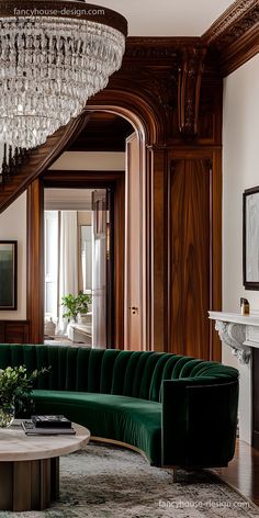 a living room filled with furniture and a chandelier