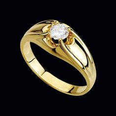 a gold ring with a diamond in the center