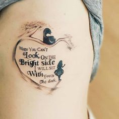 a woman's stomach with a quote tattooed on it that says, when you can't look on the bright side