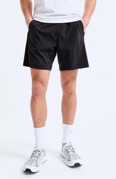 Be workout-ready and on trend in these lightweight training shorts cut with a shorter inseam. They're made from moisture-wicking fabric with laser-cut mesh side panels for extra breathability. 7" inseam; 25" leg opening; 11 1/2" front rise Elastic/drawstring waist Front slant pockets; hidden sweat-resistant side-zip pocket Moisture-wicking fabric engineered for dryness and comfort Four-way-stretch fabric 85% nylon, 15% spandex Machine wash, tumble dry Imported Sportswear Nylon Bottoms With Built-in Shorts, Functional Breathable Short Leg Bottoms, Functional Breathable Shorts, Breathable Functional Short Bottoms, Breathable Functional Shorts, Sporty Nylon Bottoms With Built-in Shorts, Relaxed Fit Nylon Gym Bottoms, Functional Gym Bottoms With Short Legs, Moisture-wicking Nylon Workout Bottoms