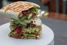 a stack of food sitting on top of a white plate