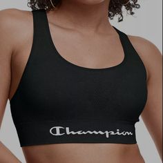 Perfect For Medium-Impact Activities Double Dry Wicking For Moisture Management To Help Keep You Cool And Dry Seamless Design To Minimize Chafing Stretch For Ease Of Movement Removable Bra Cups Offer Shape And Modesty Wire Free Fabric & Care 94% Recycled Nylon, 6% Spandex Machine Wash Imported Black Breathable Racerback Bra, Sports Bra In Seamless Fabric, Black Sports Bra With Seamless Design And Medium Support, Micro-elastic Black Sports Bra, Black Compressive Seamless Sports Bra, Compressive Black Seamless Sports Bra, Black Seamless Athleisure Sports Bra, Supportive Black Seamless Bra, Black Bra With Seamless Construction And Medium Support