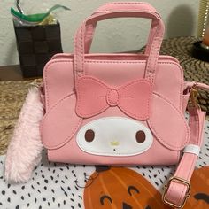 The Cutest Thing Ever Statement Bags Just Dropped Sanrio Originals! Get Yours Today! Awesome Quality Fits My Phone (Iphone 12 Pro Max), Keys And Mini Card Wallet With A Mascara And 2 Lipsticks Cute Handheld Bag With Detachable Strap, Cute Rectangular Shoulder Bag With Detachable Strap, Cute Shoulder Bag With Detachable Strap, Cute Rectangular Satchel, Cute Portable Rectangular Satchel, Kawaii Bags With Detachable Strap For Daily Use, Cute Portable Pouch Satchel, Cute Satchel Bag With Detachable Strap, Cute Handheld Shoulder Bag With Detachable Strap