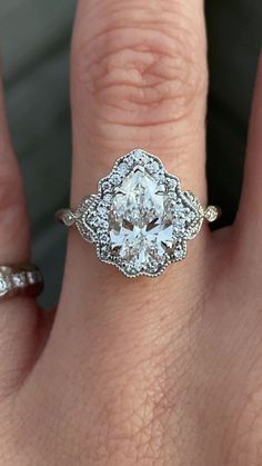 a woman's engagement ring on her finger