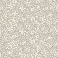 an old wallpaper with white flowers and leaves on the side, in shades of gray