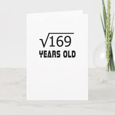 a white greeting card with the words v169 years old printed in black on it