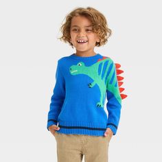 Your dinosaur-loving toddler will simply adore this Dino Pullover Crewneck Sweater from Cat & Jack™. Showcasing a dino pattern with spikes coming out of one sleeve, this knitted sweater makes a fun addition to their cool-weather closet. This pullover sweater is designed with a crew neckline with ribbed cuffs and hem for a snug fit. Cat & Jack™: Designed for all children so you can trust it's made for yours. Dino Pattern, Boy Blue, Sweater Making, Cat & Jack, Knitted Sweater, Crewneck Sweater, Toddler Boys, Coming Out, Pullover Sweater