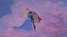 a man and woman dressed in blue are flying through the sky